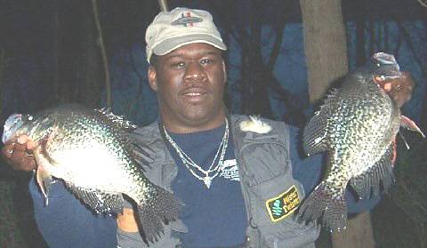 Pictured here is Gregory Harris from Mount Vernon, NY. In March of 2004 he was fishing on New Croton Reservoir in Westchester County. Thats where he caught these two big Crappies that weighed in at 1.9 and a 2.2 pounds