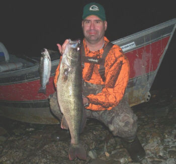 Ken Hemshrot with his Lake Ontario trophy 14 pound walleye