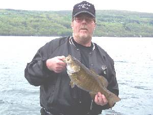 Jack Dillion with a nice Keuka lake bass in May 2003