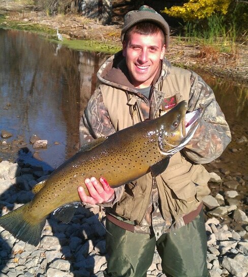  Benjamin LaDuca is pictured here with a 15 pound 31 inch brown trout, that he caught at 18 Mile Creek Olcott NY