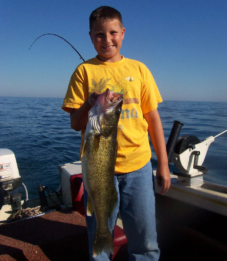 Michael Seggio with his first walleye it was a beautiful 27 inch fish that weighed in at 7 pounds