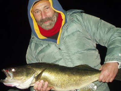 Mike Siegal displays a awesome walleye that he caught and released while night fishing along the Lake Ontario shoreline
