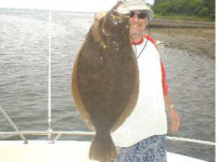 James Tully with an 8 pound 12 ounce fluke from Shinnecock Inlet